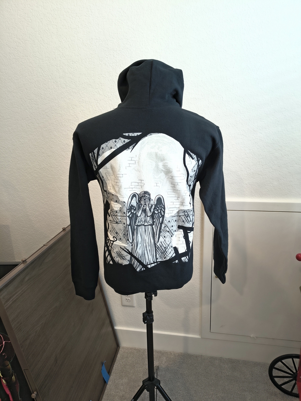 Black Graphic Zip-Up Hoodie with Angel Back Print